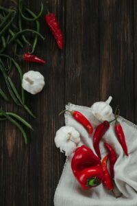 White and Red Rose on Brown Wooden Surface