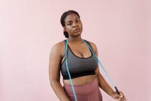 Woman in Black and Blue Sports Bra and Pink Panty