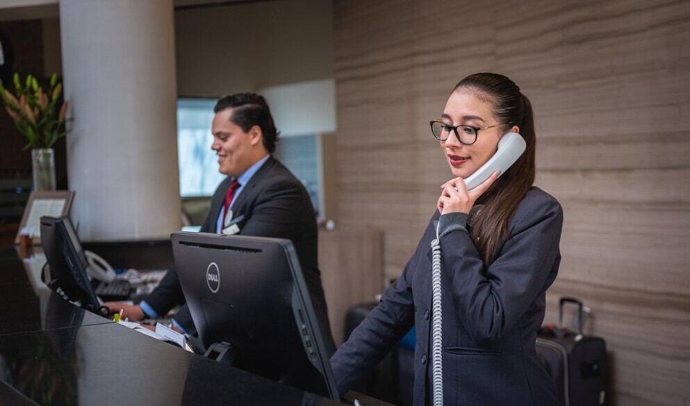 A man and a woman are standing while on call as part of their weight loss strategies